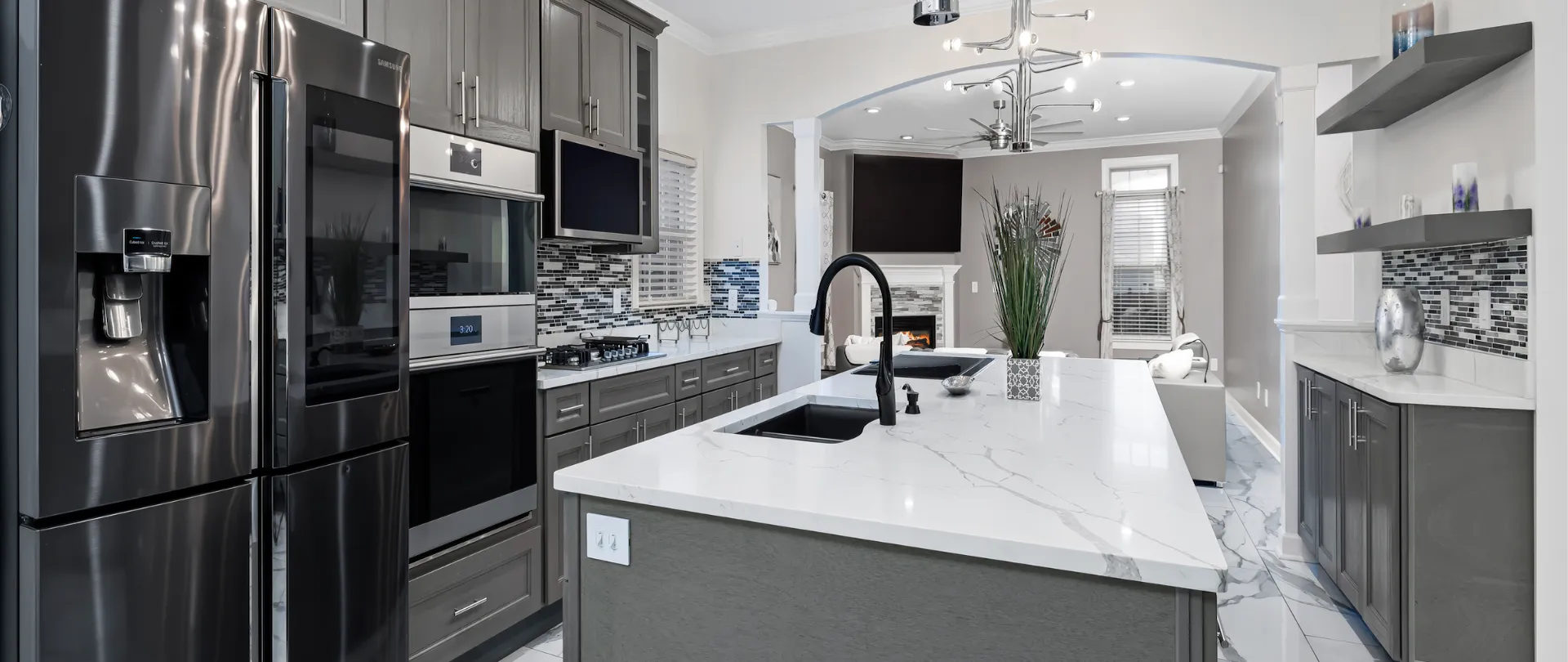 Kitchen renovation with grey base cabinets by CabinetEZ, Clinton, MD.